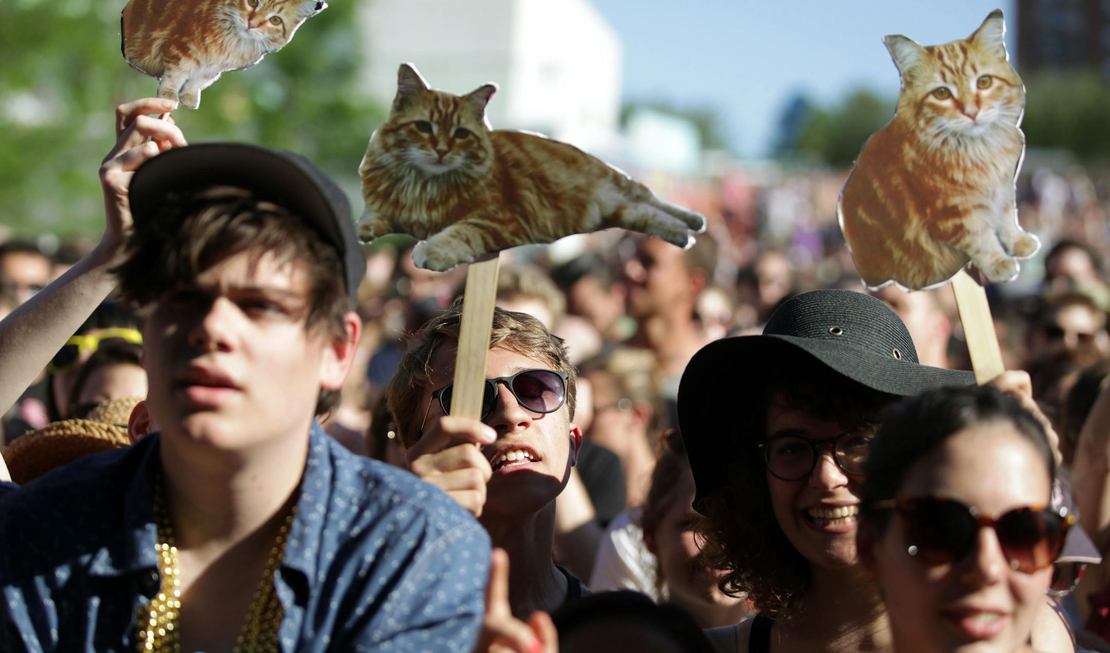 Sebastian Eising (center) watches Best Coast perform during the first day of Rock the Garden. ] Rock the Gardens was held Saturday afternoon at the Walker Art Center in Minneapolis. MONICA HERNDON monica.herndon@startribune.com Minneapolis, MN 06/21/2014