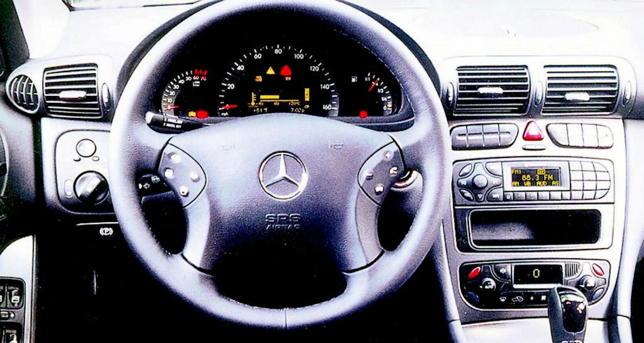 ABOUT-CARS-MERCEDES-2 -- The 2001 Mercedes Benz C-Class series exudes a visual richness and refinement of construction that to drive one is to become suddenly and hopelessly smitten. Also known as a Baby Benz, it is stuffed with lots of high-end hardware, including a voice-activated telephone and stereo system, climate controls and multi-function steering wheel. The 2001 Mercedes Benz C-Class sedan has buttons on the thick-rimmed steering wheel that gives the driver control over the telephone an