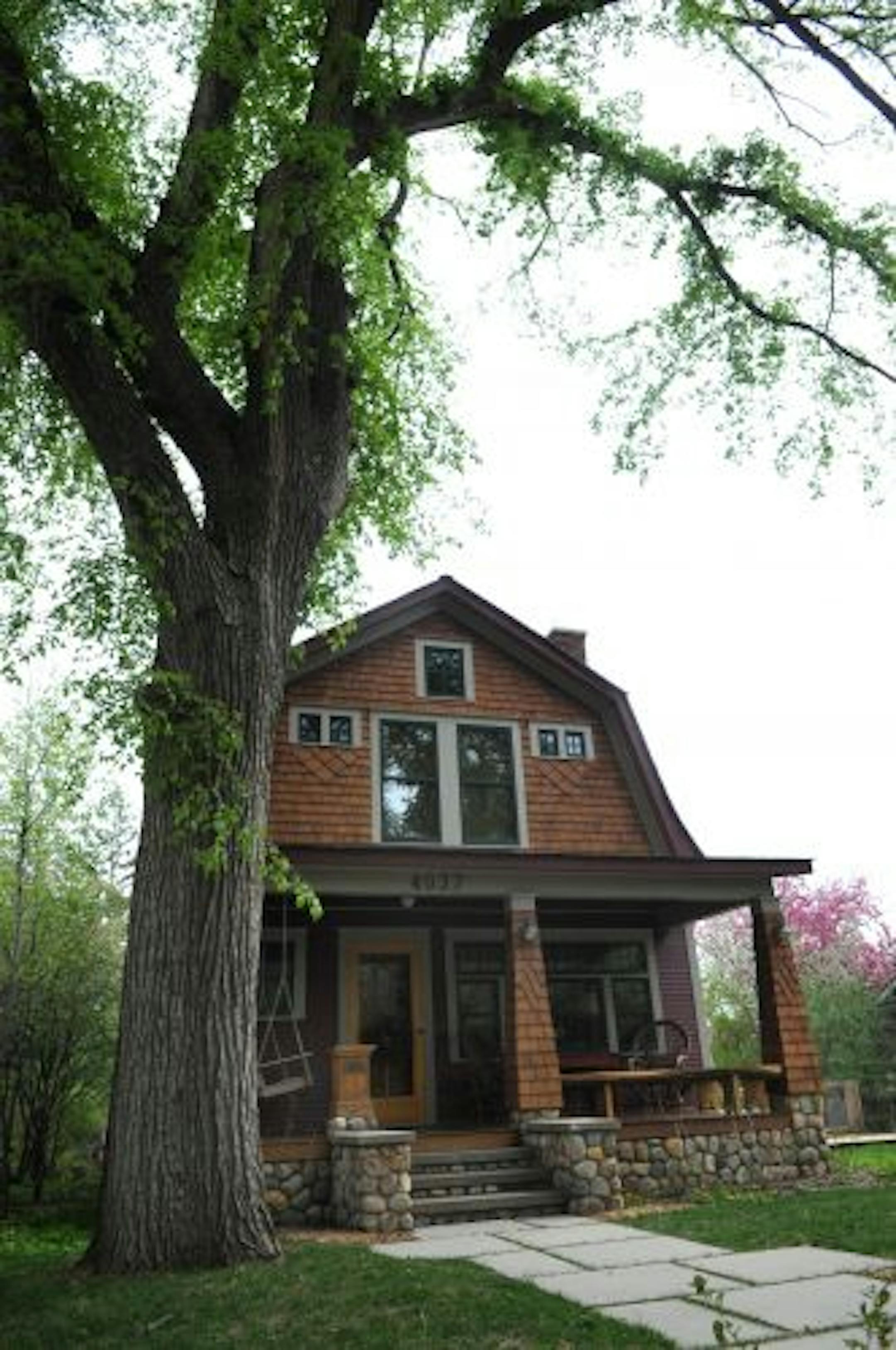 Bruce Chamberlain re-sided the exterior of his Minneapolis home with radial-sawn clapboards and cedar shakes.