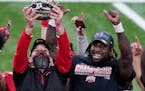 Ohio State coach Ryan Day, left, and running back Trey Sermon celebrated after the Buckeyes defeated Northwestern in the 2020 Big Ten Championship Gam