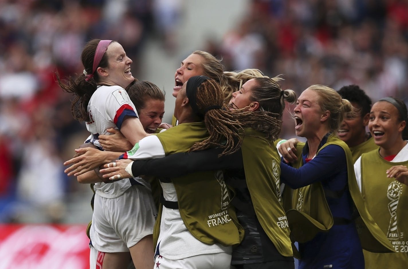 Rose Lavelle, left, celebrates after scoring her side's second goal during the Women's World Cup final.