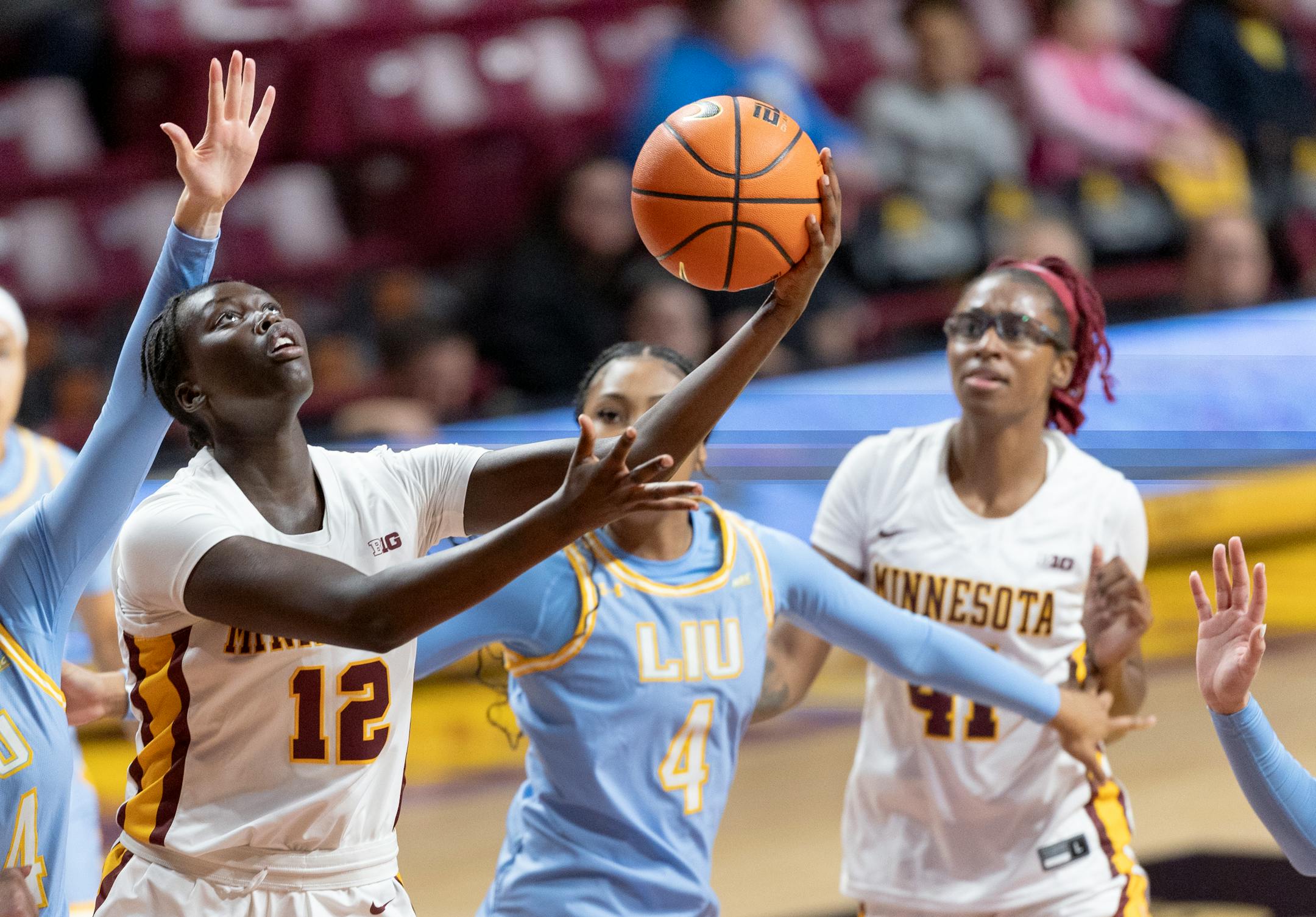Ajok Madol (12) of Minnesota attempts a shot in the fourth quarter Wednesday, November 8, 2023, at Williams Arena in Minneapolis, Minn. ] CARLOS GONZALEZ • carlos.gonzalez@startribune.com