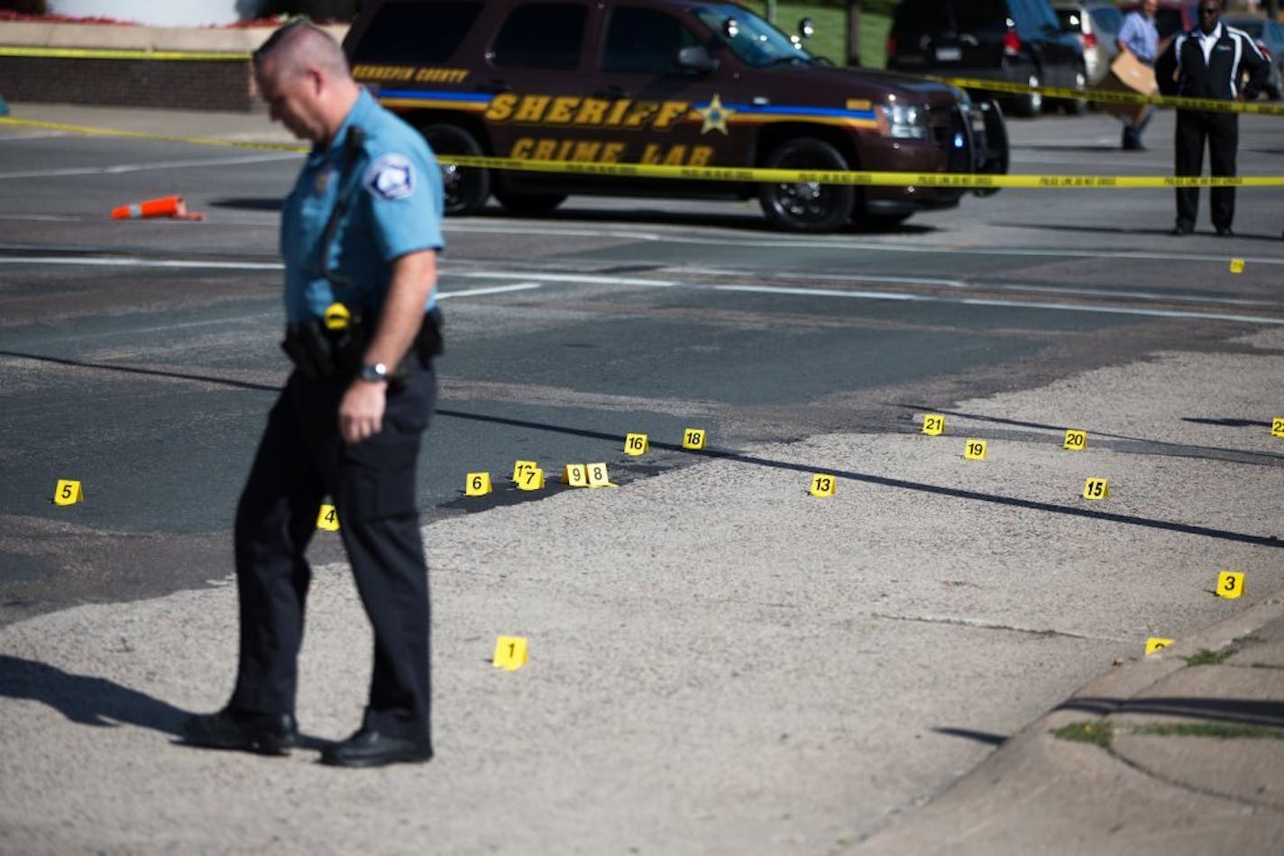 Dozens of shell casings littered the street outside HCMC after a gang shooting on Aug. 26, 2014.