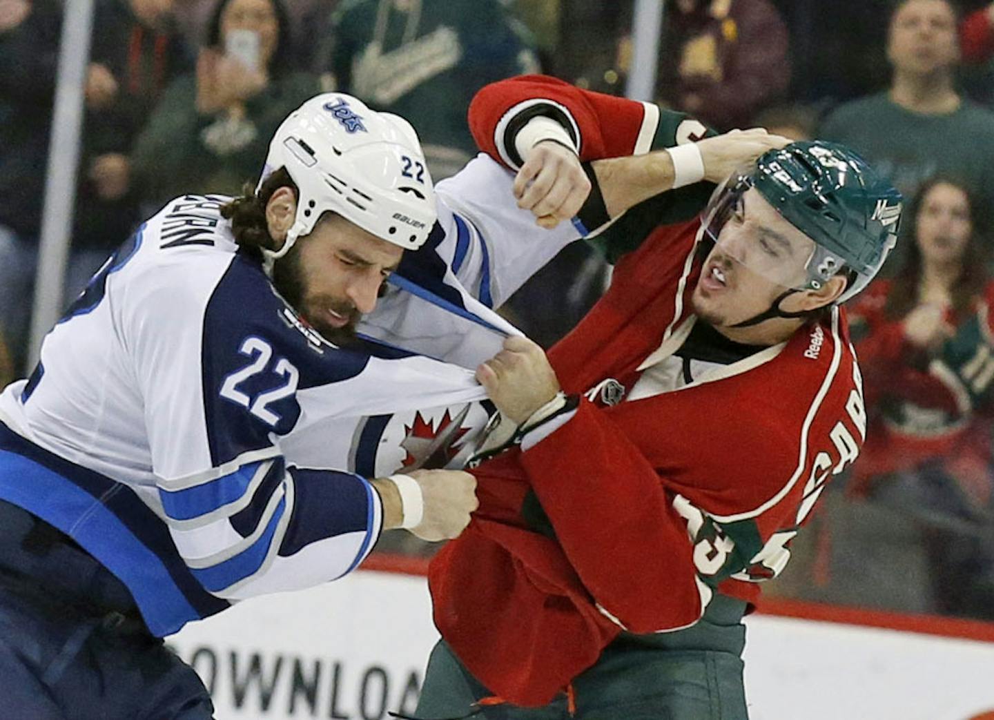 Winnipeg Jets right wing Chris Thorburn (22) and Minnesota Wild right wing Kurtis Gabriel, right, fight during the second period of an NHL hockey game in St. Paul, Minn., Tuesday, Nov. 10, 2015. (AP Photo/Ann Heisenfelt)