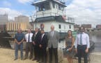 A group of business, nonprofit and government officials involved in the greening of the tugboat Itasca last week. Photo: Project Greenfleet.