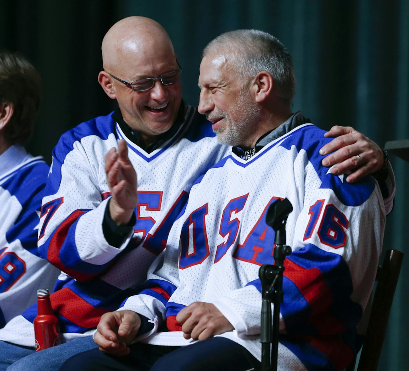 Jack O'Callahan, left, and Mark Pavelich of the 1980 U.S. ice hockey team talk during a "Relive the Miracle" reunion at Herb Brooks Arena on Saturday, Feb. 21, 2015, in Lake Placid, N.Y.