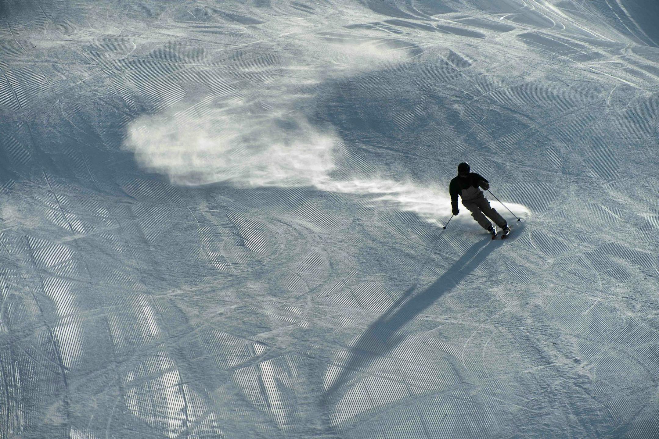 A skier bombed down a hill at Afton Alps on Monday afternoon. Christmas Day is likely to be the coldest Christmas in 20 years, but that didn't stop skiers, snowboarders and snow tubers from hitting the slopes.