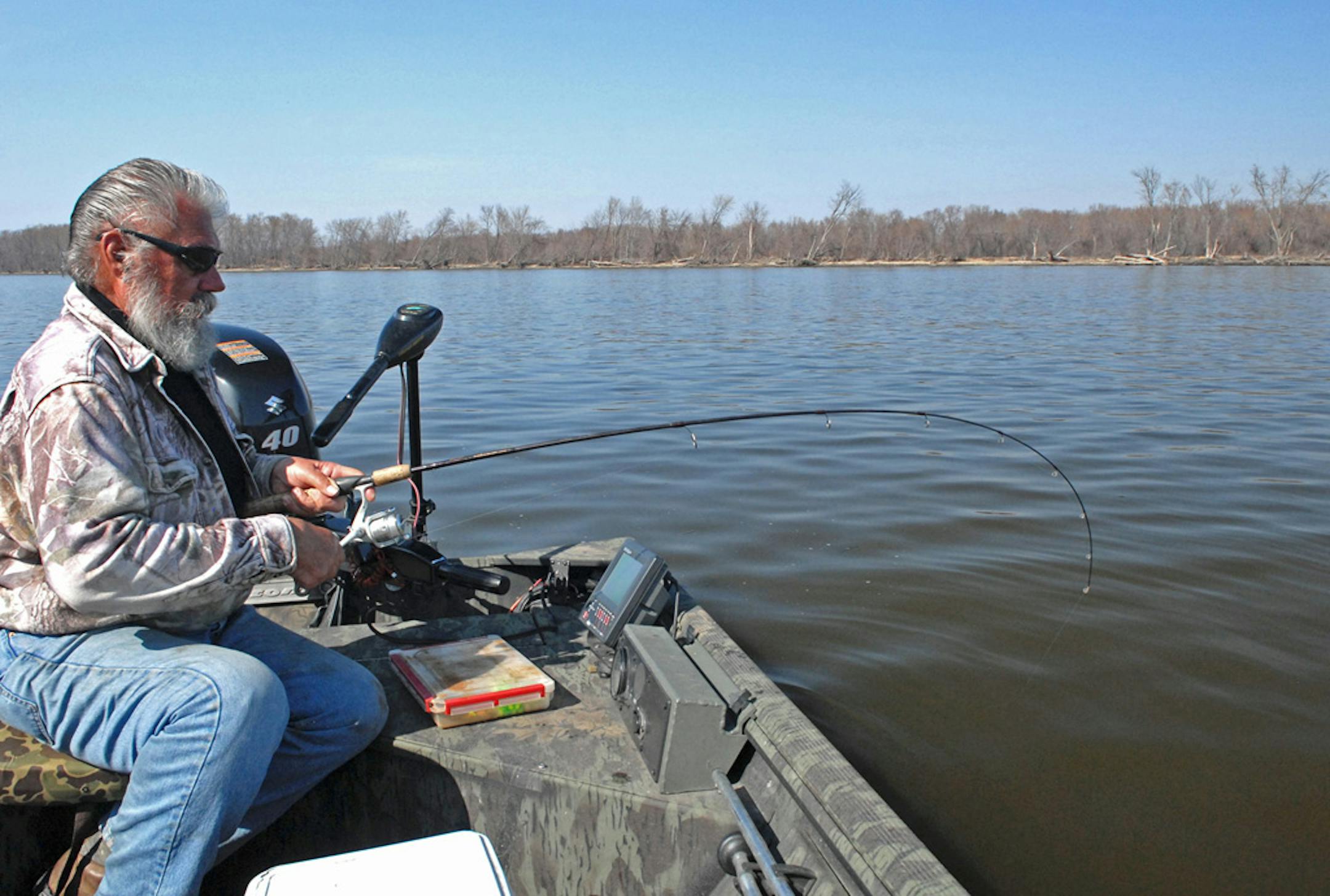 Fishing on the Mississippi River.