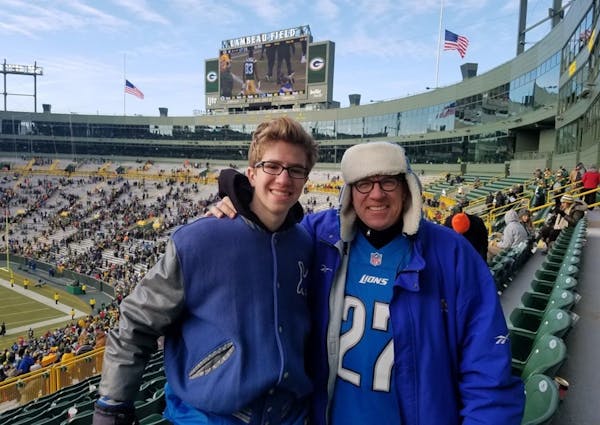 Radio host Dan Cole and his son, “Deuce,” took in a Lions-Packers game at Lambeau Field.