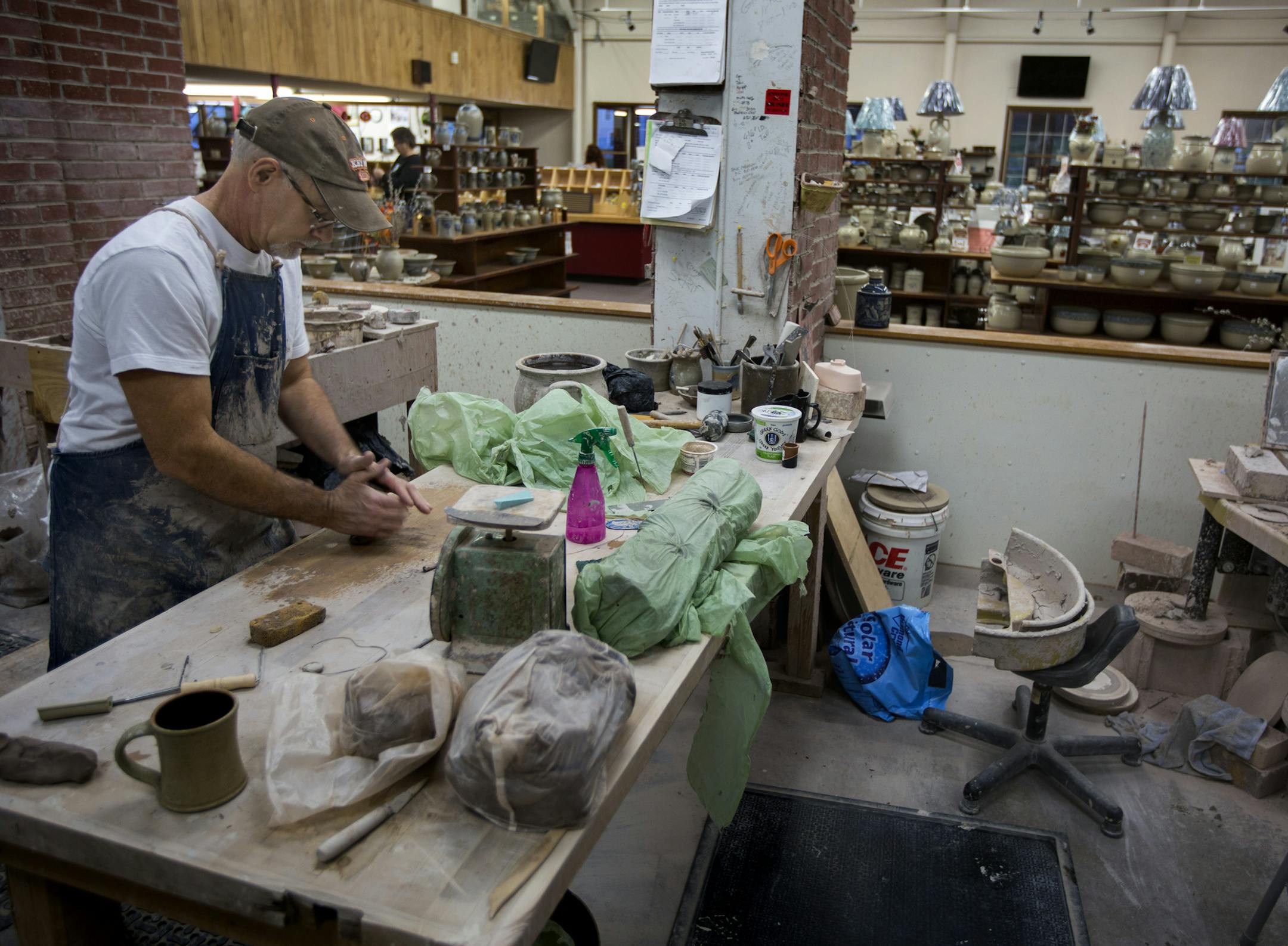 Mark Connolly, the potter at the Red Wing company will transfer to a different job when the store closes. The Red Wing pottery retail store will be closing December 24th.] Brian.Peterson@startribune.com Red Wing, MN - 12/09/2015