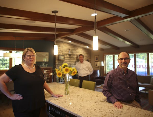 Dennis and Shelly Zuzek updated the kitchen, dining, and living rooms of their 1960's era home in Edina with the help of builder Bjorn Freudenthel. Sh