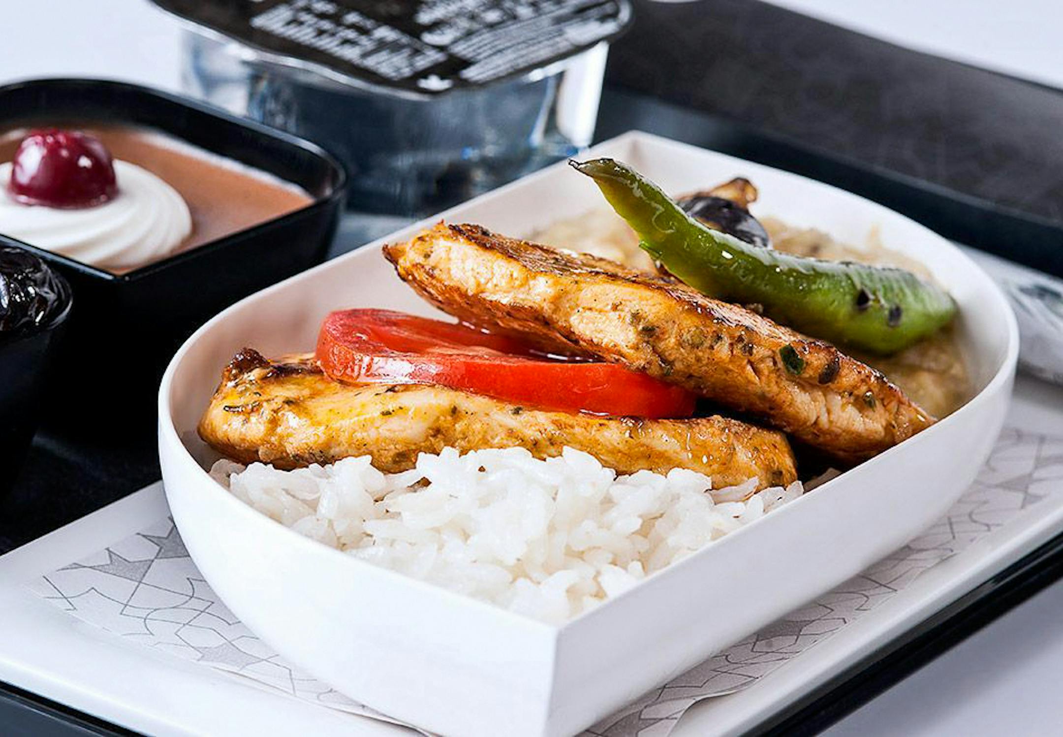 In a photo provided by Turkish Airlines, a gluten-free meal offered in economy class on Turkish Airlines: chicken breast over rice, with a caprese salad and chocolate mousse. Both international and domestic airlines report a rise in special meal requests in recent years, and many are trying to accommodate them by broadening their special meals categories. (Turkish Airlines via The New York Times) -- NO SALES; FOR EDITORIAL USE ONLY WITH AIRLINE MEALS BY SHIVANI VORA FOR AUG 19, 2018. ALL OTHER U