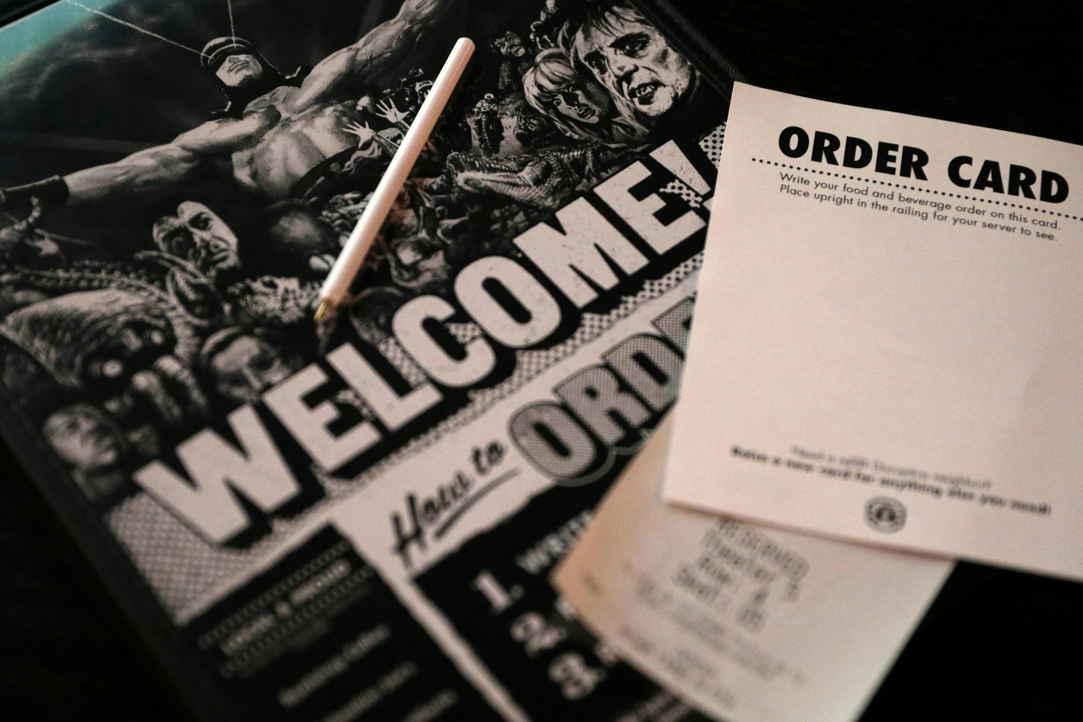 Alamo Drafthouse Cinema features no concession stand. Instead, patrons write their food order, even for popcorn and soda, on an order card and it's brought out by servers.