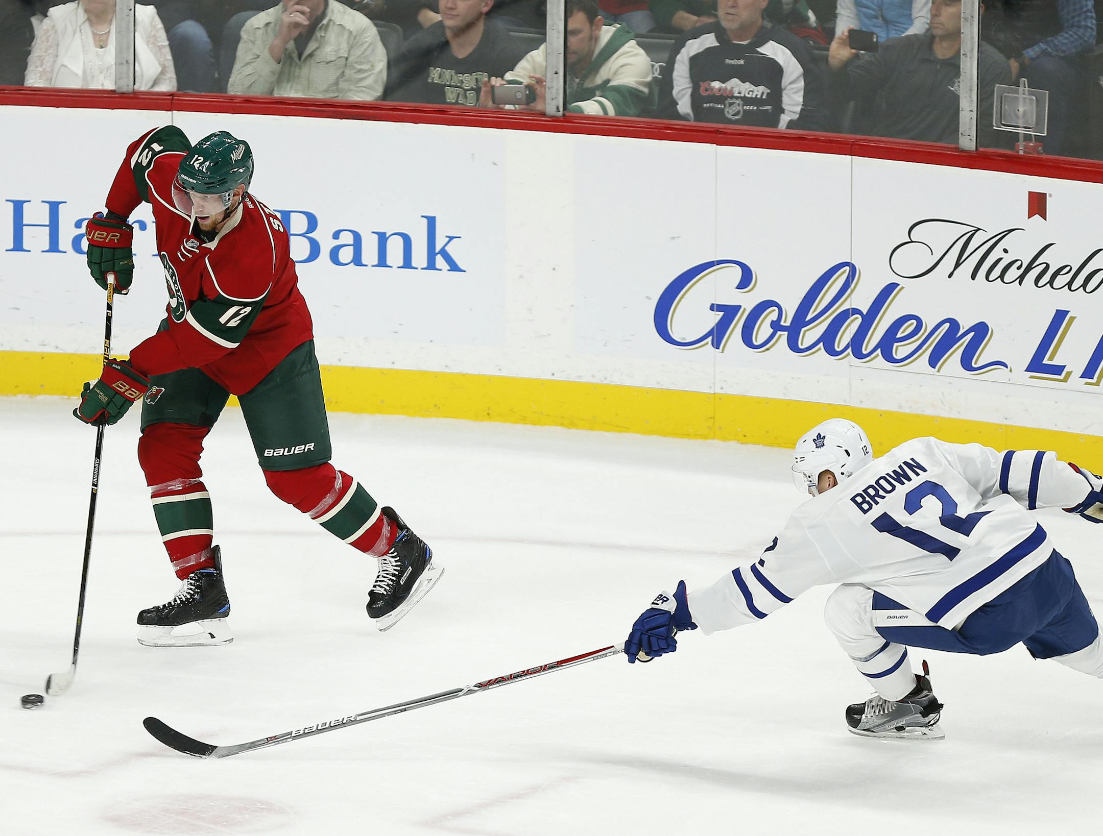 Center Eric Staal (left) scored two goals, including the game-winner in the third period, to lift the Wild over Toronto 3-2 on Thursday.