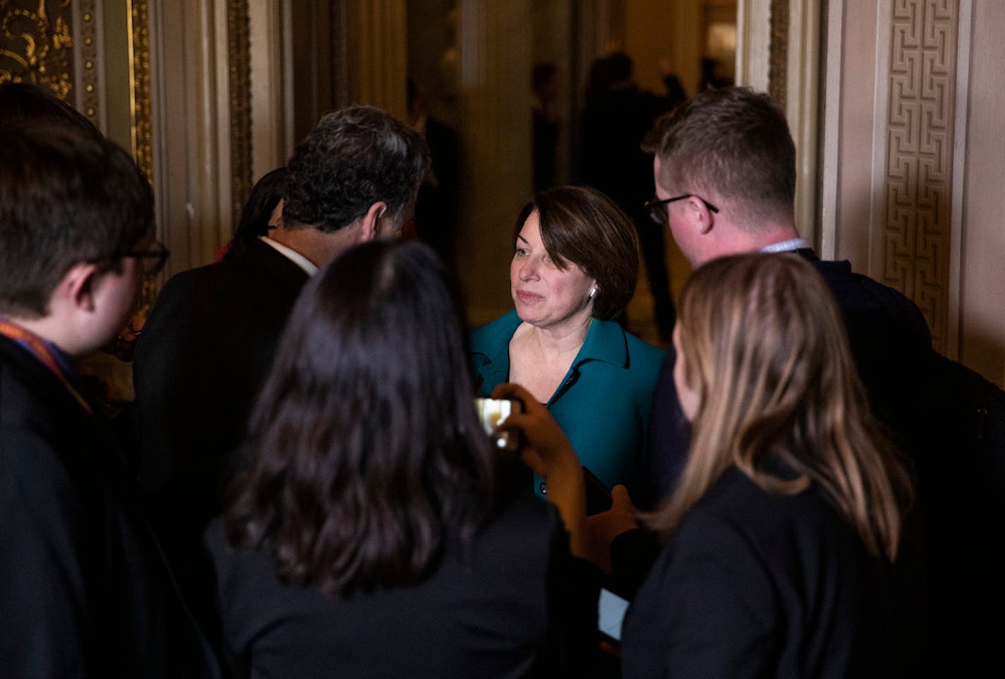 Sen. Amy Klobuchar (D-Minn.) speaks with reporters at the Capitol in Washington as the Senate impeachment trial of President Donald Trump prepares to start on Tuesday, Jan. 21, 2020.