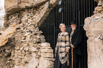 Jane and John Olive, outside the ruins of Mantorville's Civil War-era brewery, are leaders of preservation efforts.