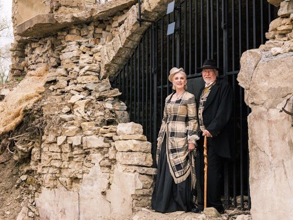 Jane and John Olive, outside the ruins of Mantorville's Civil War-era brewery, are leaders of preservation efforts.