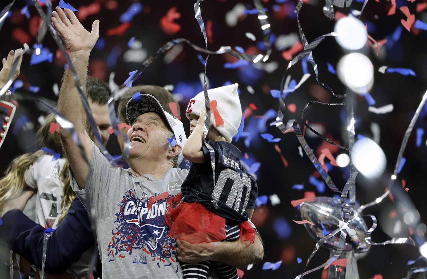 New England Patriots head coach Bill Belichick celebrates in the confetti after the NFL Super Bowl 53 football game against the Los Angeles Rams, Sunday, Feb. 3, 2019, in Atlanta. The Patriots won 13-3. (AP Photo/John Bazemore)