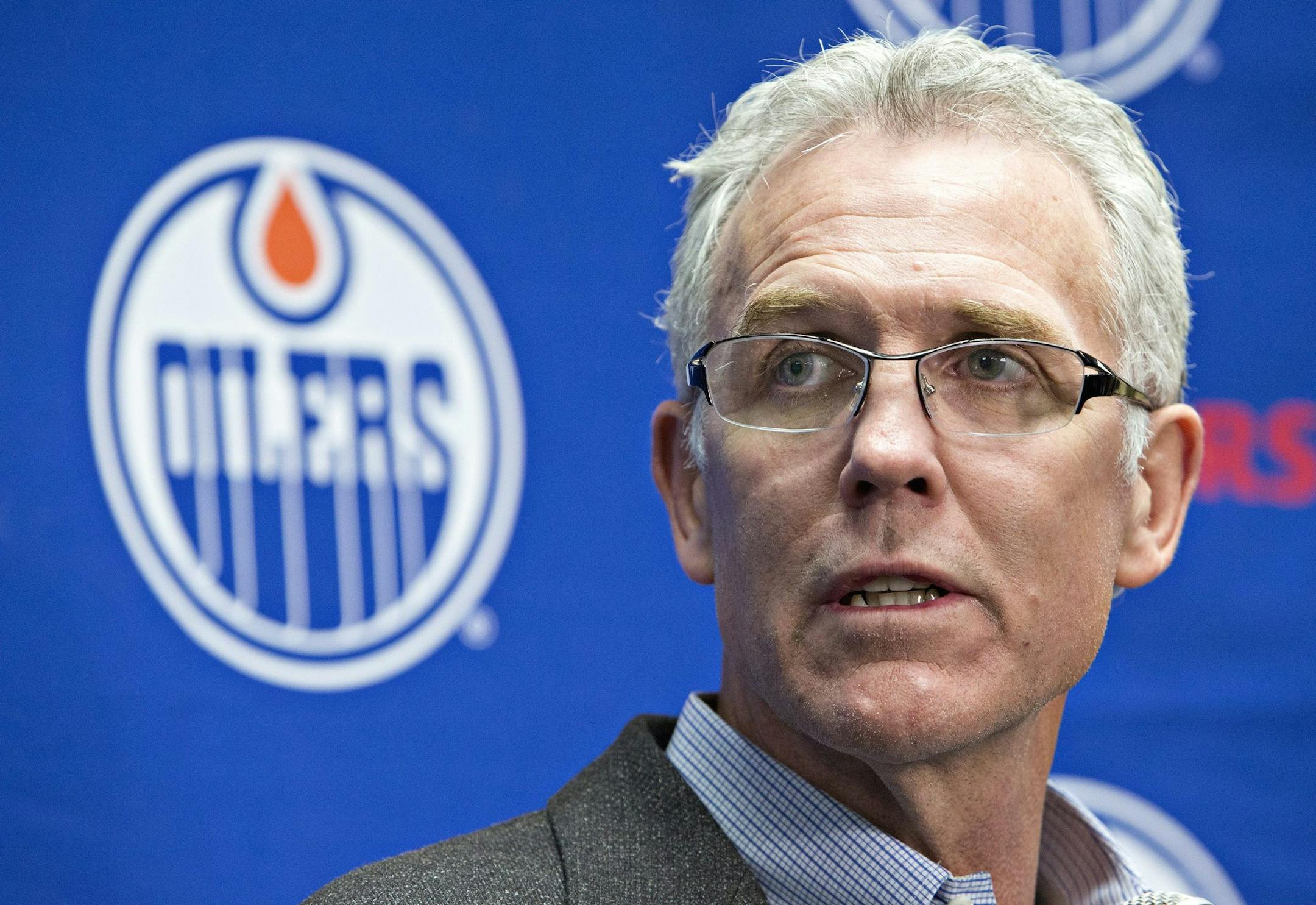 Edmonton Oilers General Manager Craig MacTavish speaks about the firing of head coach Dallas Eakins in Edmonton, Alberta, Monday Dec. 15, 2014. (AP Photo/The Canadian Press, Jason Franson)