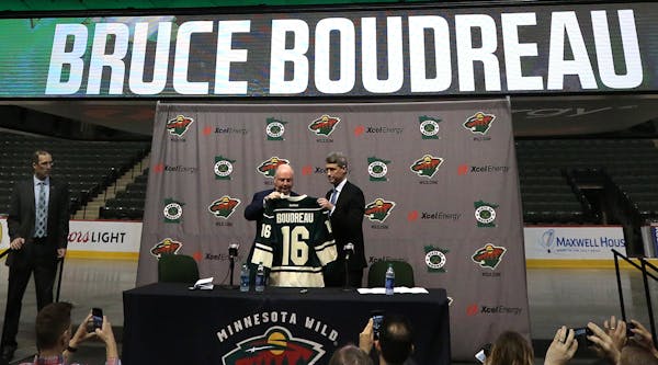 New Minnesota Wild general manager Chuck Fletcher (right) introduced new head coach Bruce Boudreau in May. The team opens training camp Thursday.