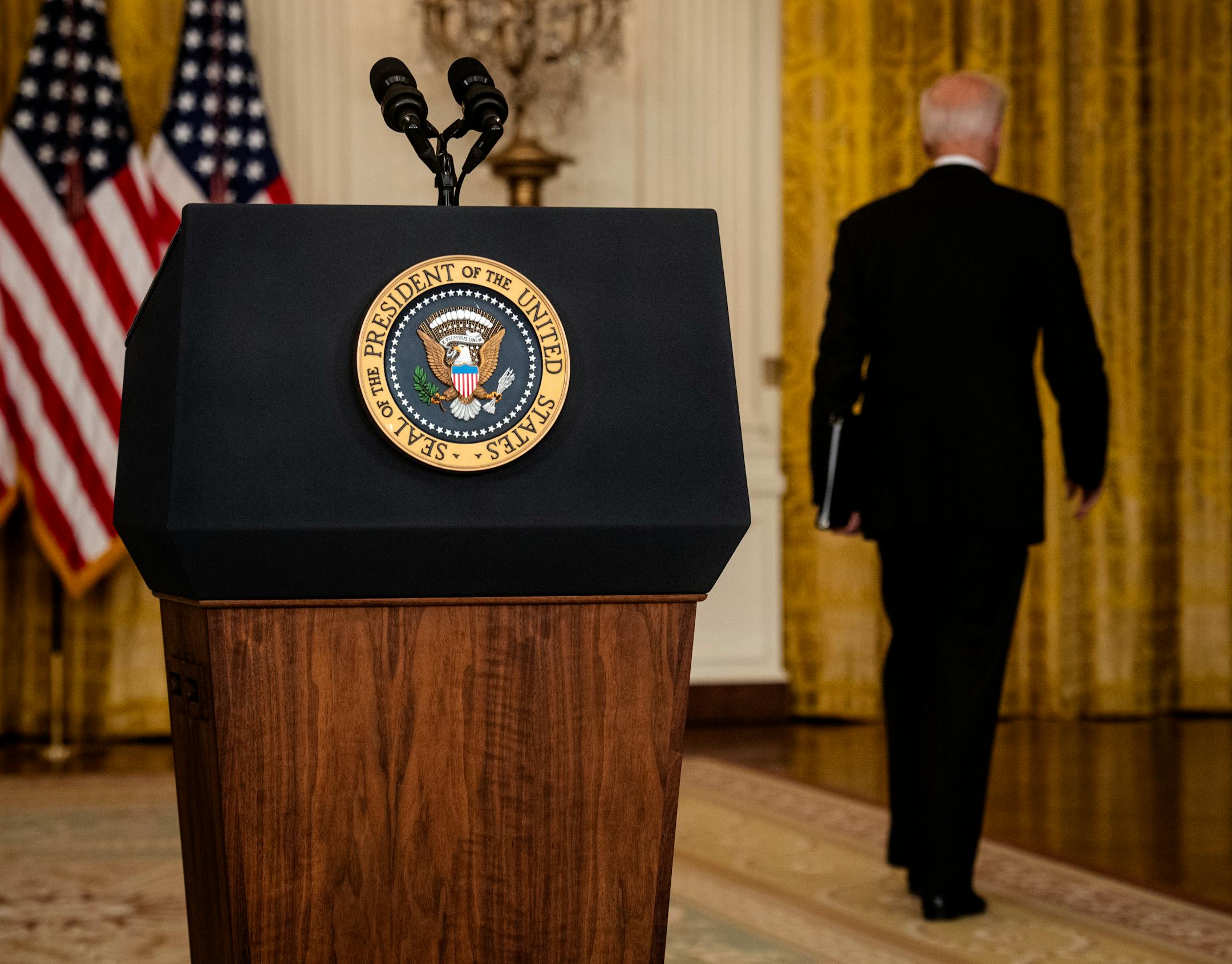 Preisdent Joe Biden walks away Monday after delivering remarks on the situation in Afghanistan. MUST CREDIT: Washington Post photo by Bill O'Leary.