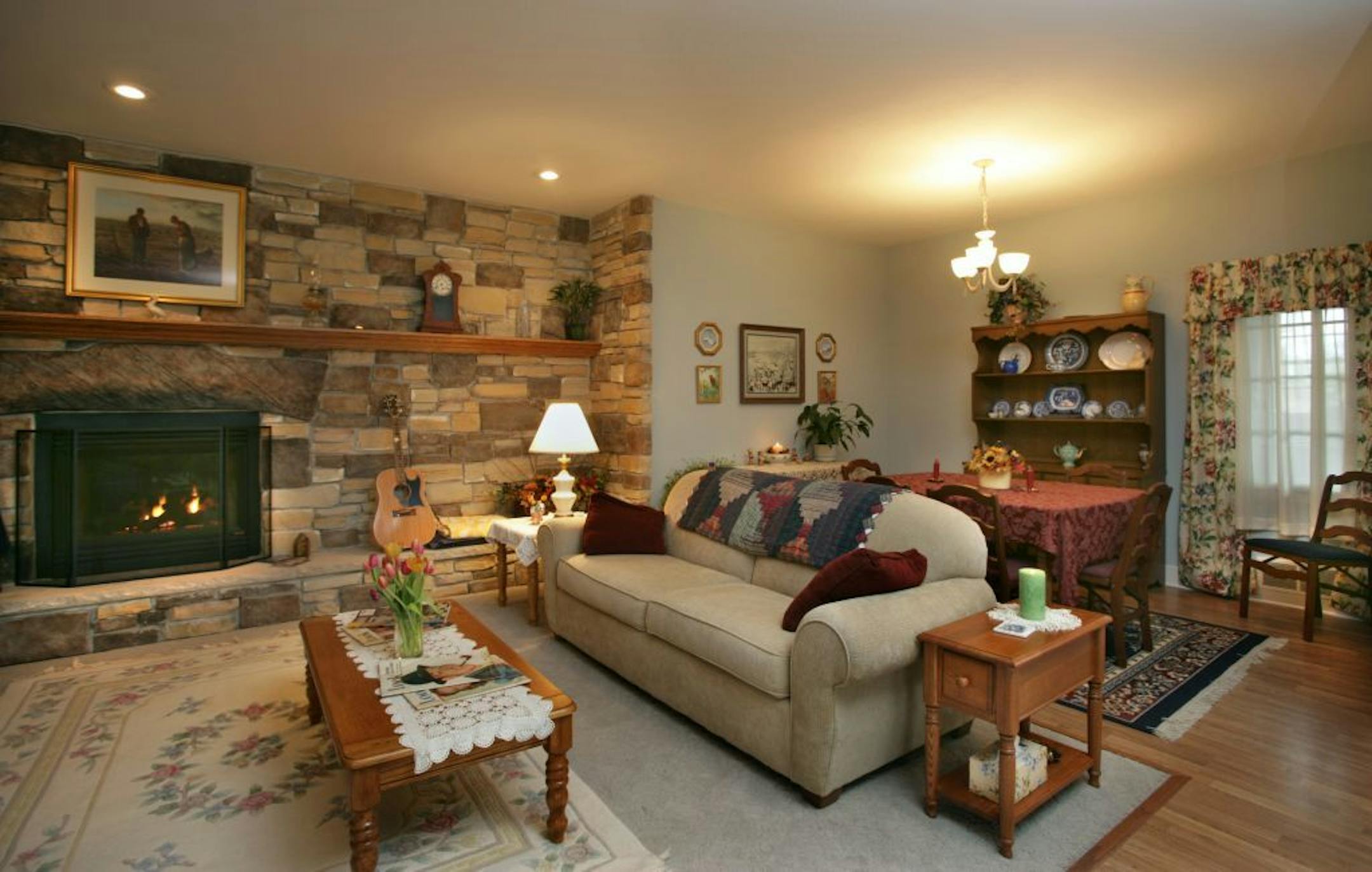 Joel Koyama�jkoyama@startribune.com Andy Griffith would feel right at home in Dave and Marsha Scheurman's home. The couple, such devoted fans of "The Andy Grifith Show" that they met in a fan-club chat room, have now built a faithful replica of Andy's house. Dave designed the exterior himself, and they've furnished the inside to match, down to the blue willow china and Grandma Moses paintings. The livingroom looking toward the fireplace with the diningroom in the background.