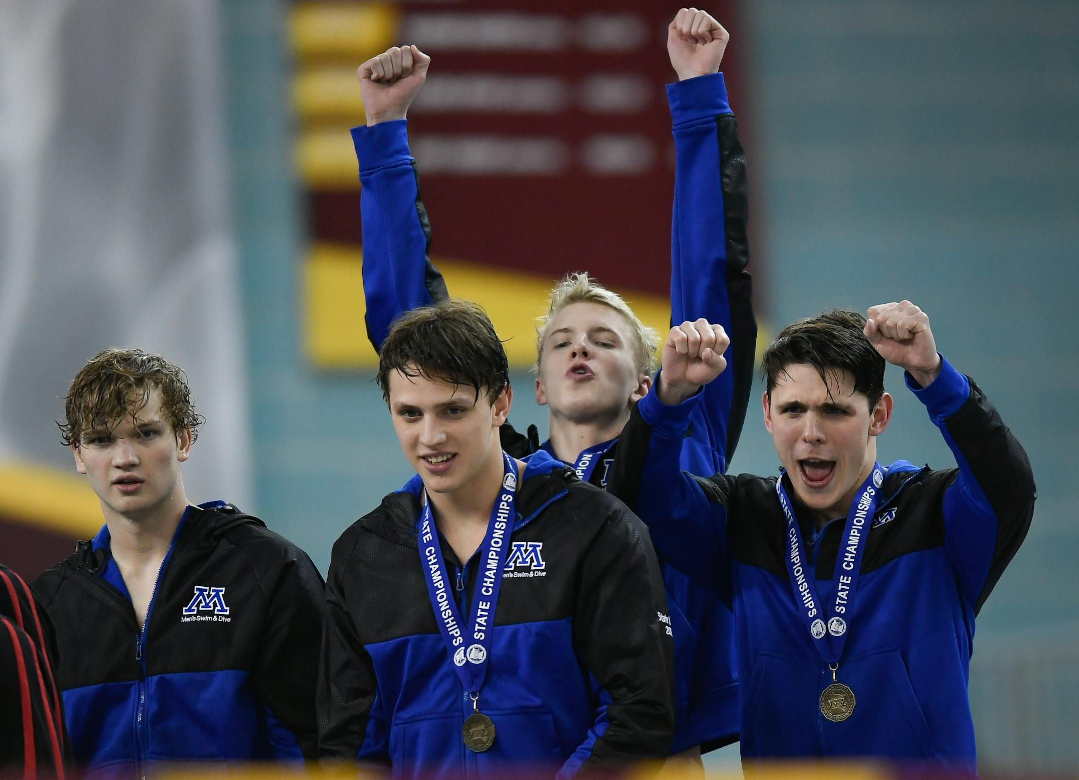 From left, Minnetonka's Erik Gessner, Michael Shelstad, Isaac Alberts and John Shelstad celebrated their first-place win in the Class 2A 200 yard freestyle relay Saturday at the University of Minnesota. (Aaron Lavinsky/Star Tribune)