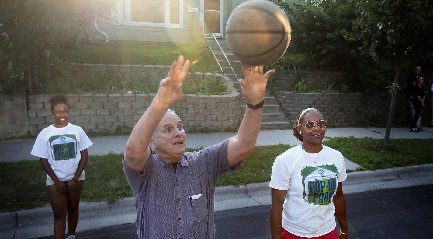 Governor Mark Dayton shot a jump shot at the National Night Out block party in the 3400 block of Knox Avenue North Tuesday August 4, 2015 in Minneapolis, MN. ] Jerry Holt/ Jerry.Holt@Startribune.com