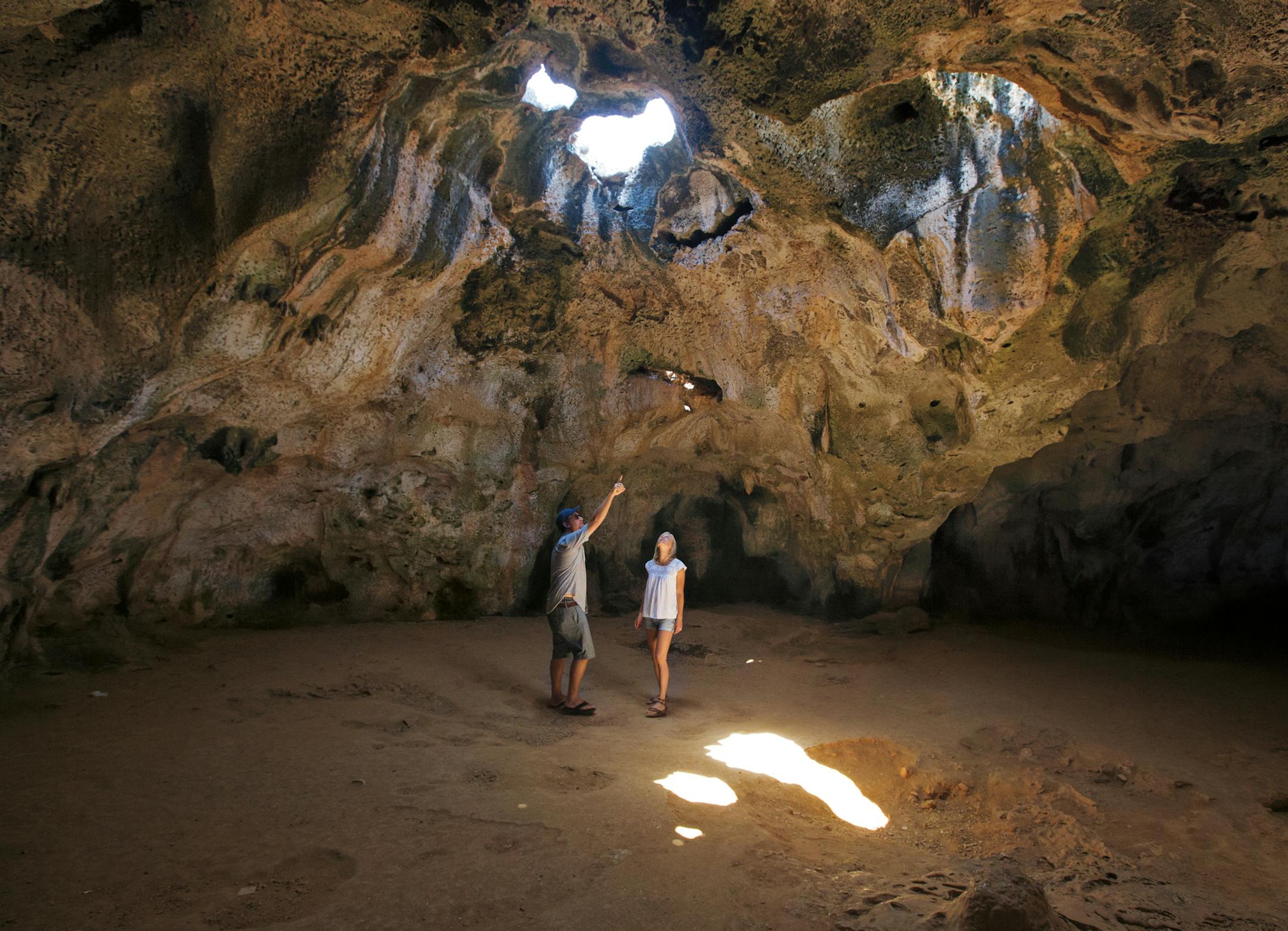 12aruba, cave interior: Exploring caves, such as this one at Guadirikiri, is one of the activities off the beach on Aruba. Photo credit: Aruba Tourism Authority