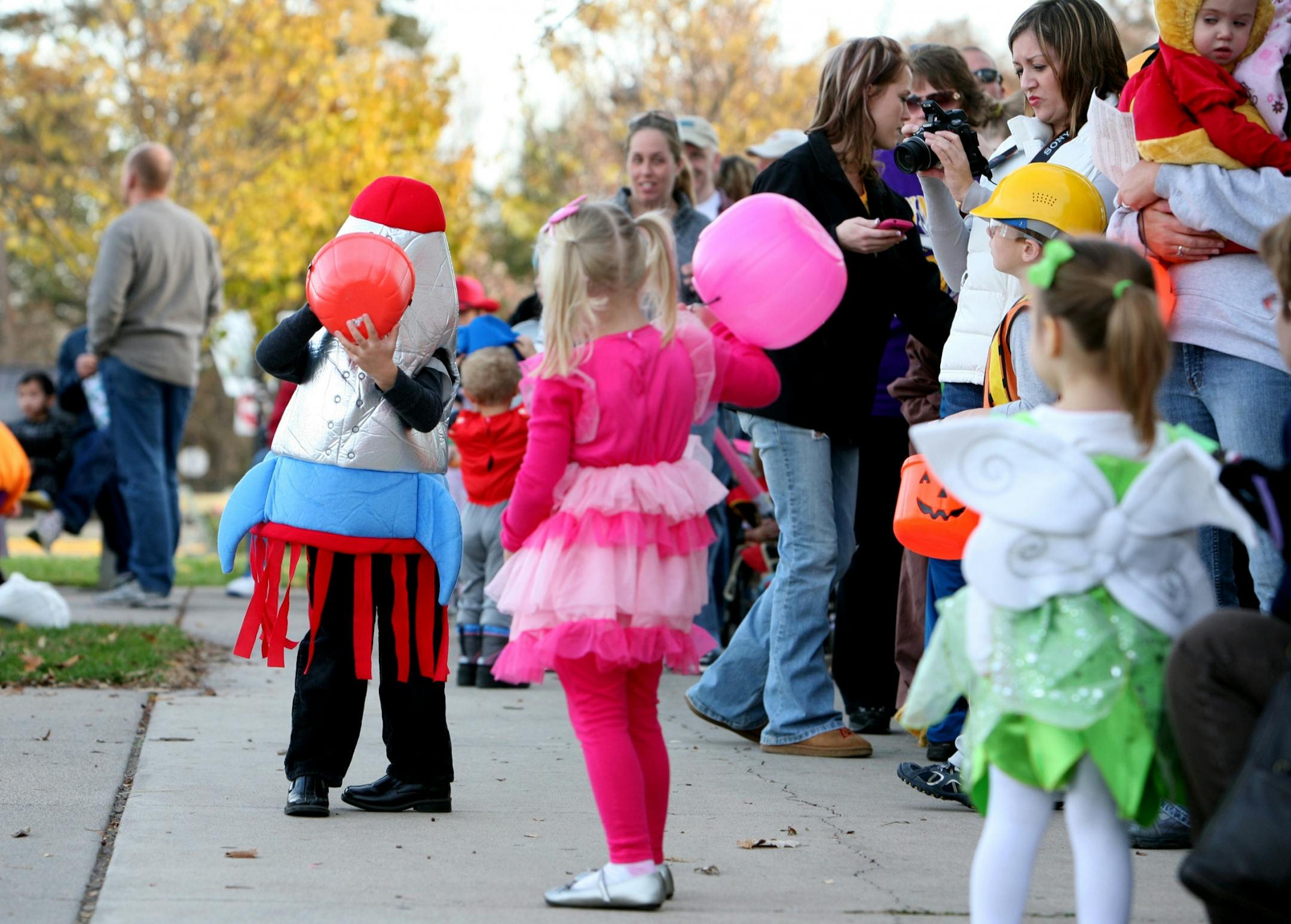 A long line of costumed guests waited for the opening of ZooBoo at Como Zoo in St. Paul October 21, 2012.