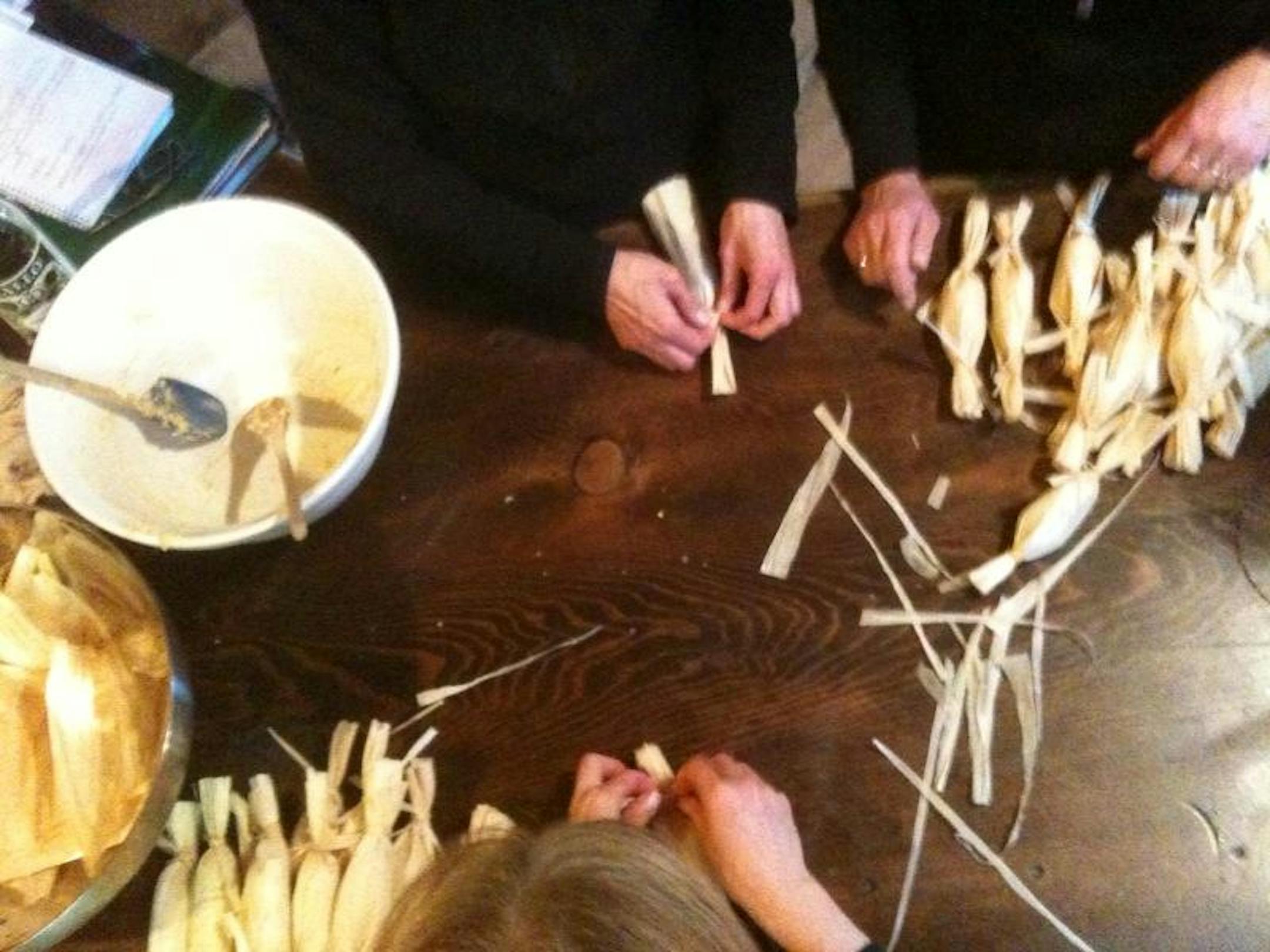 Filling and tying tamales