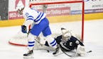Minnetonka's Hagen Burrows (19) and Chanhassen's Kam Hendrickson tangle during the section final. On Sunday,  Burrows and Hendrickson were honored as 