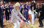 LSU coach Kim Mulkey and star Angel Reese (10) celebrated after winning an NCAA Elite Eight game last year. (Tribune News Service)