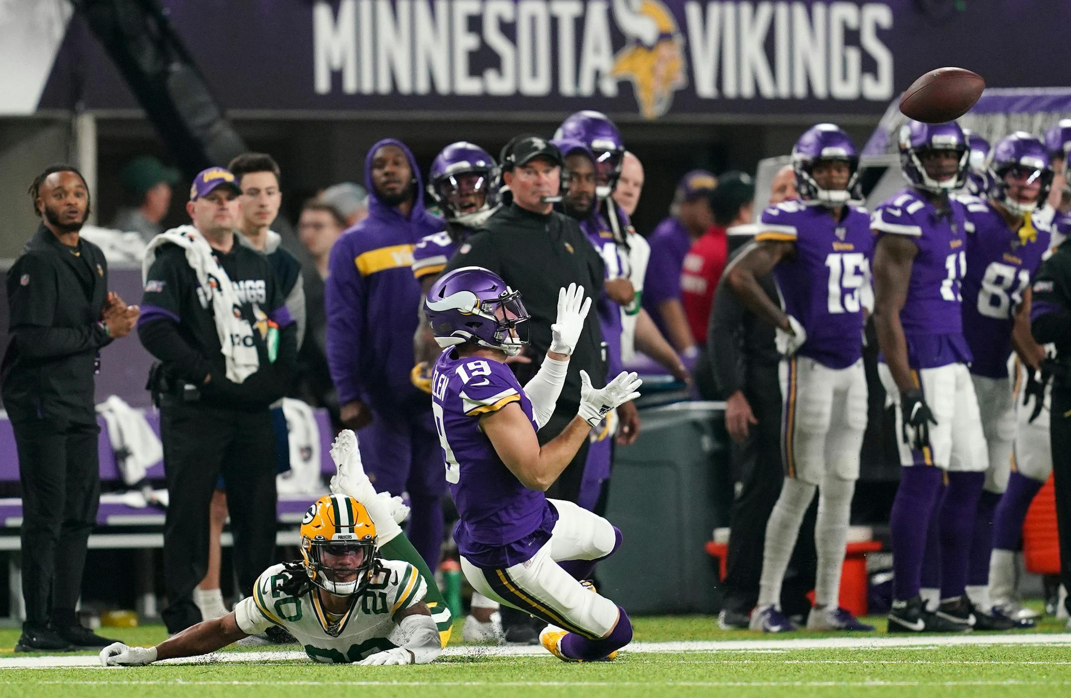 Minnesota Vikings wide receiver Adam Thielen (19) tied to complete a long pass from Minnesota Vikings quarterback Kirk Cousins (8) in the first quarter. ] ANTHONY SOUFFLE &#x2022; anthony.souffle@startribune.com The Minnesota Vikings played the Green Bay Packers in an NFL game Monday, Dec. 23, 2019 at U.S. Bank Stadium in Minneapolis.