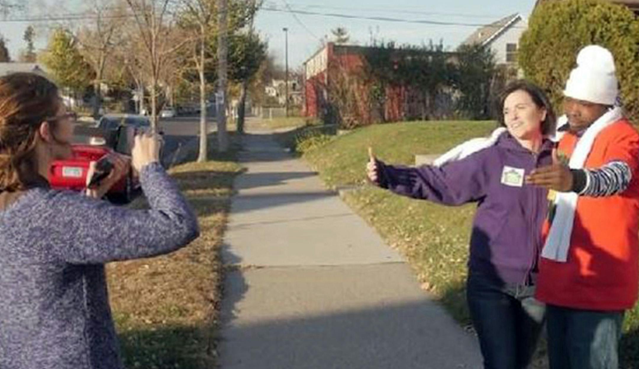 Caption: Mayor Betsy Hodges is pictured in a still from a video shot during a get-out-the-vote effort in north Minneapolis. The video by Neighborhoods Organizing for Change is posted to YouTube. Credit: Screengrab from Neighborhoods Organizing for Change video ORG XMIT: MIN1411071802460003