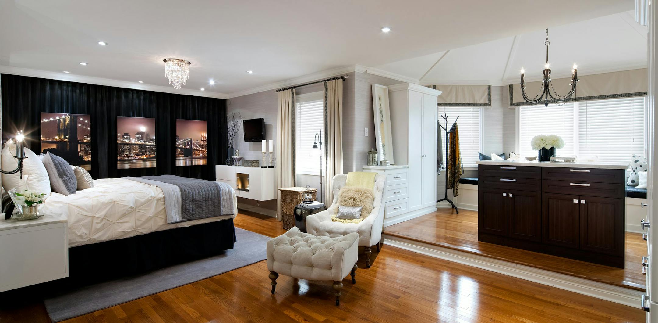 This upgraded bedroom retreat now features a king size bed, an accent wall featuring a three-piece triptych photo of the Brooklyn Bridge, an ethanol fireplace and an open-concept dressing room with an island. (Brandon Barre/MCT) ORG XMIT: 1148368