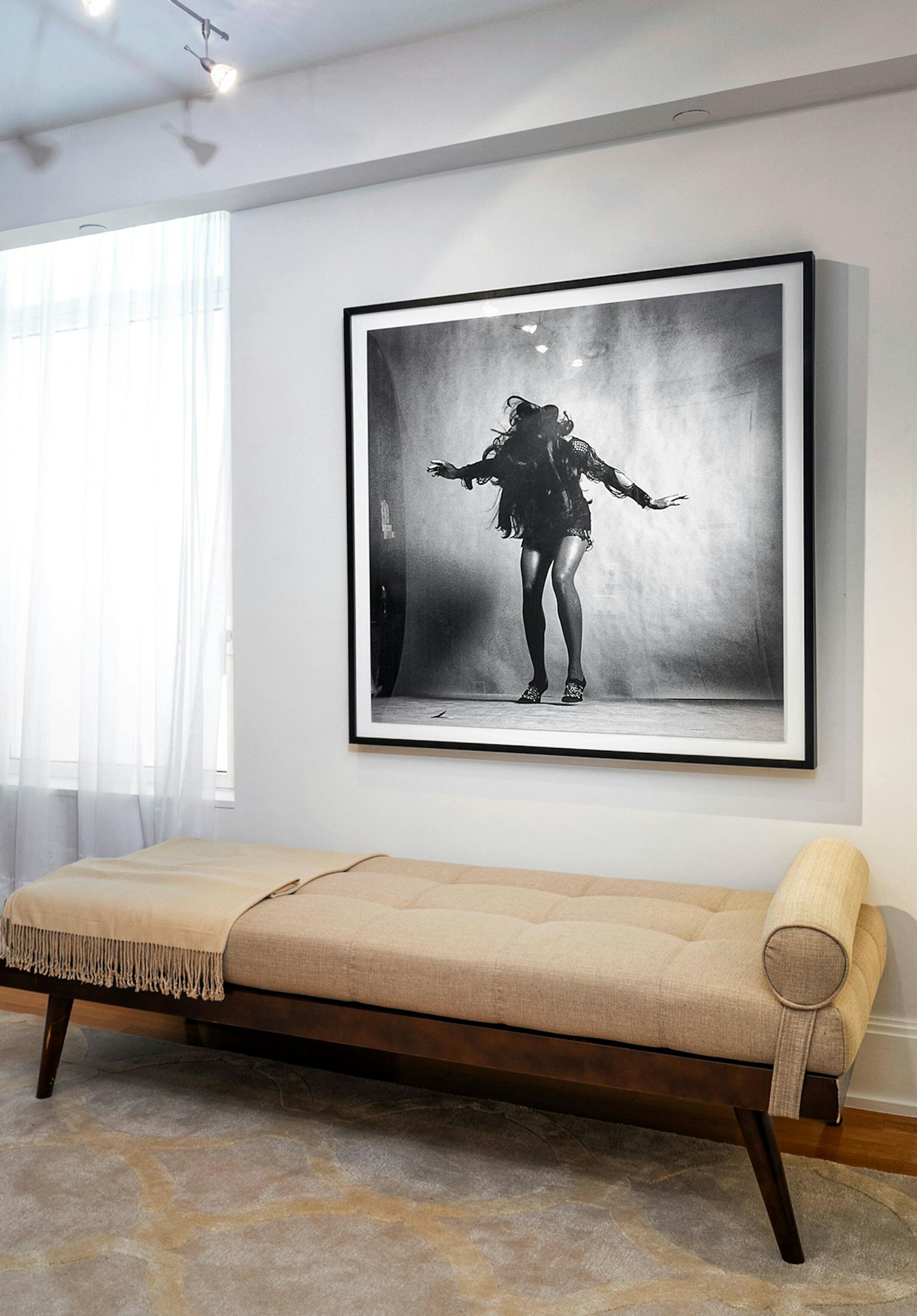 A classic black-and-white image adds a modern edge to this media room. (Design Recipes/TNS)