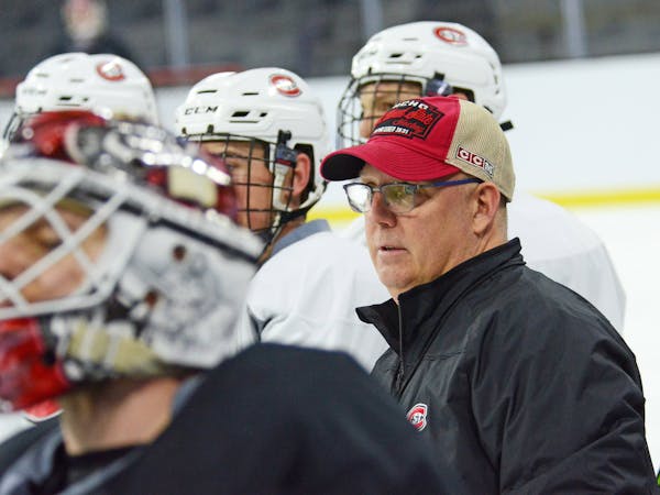 Bob Motzko watches St. Cloud State practice March 22, 2018, in Sioux Falls, S.D., while preparing for the Midwest Regional in the NCAA tournament.