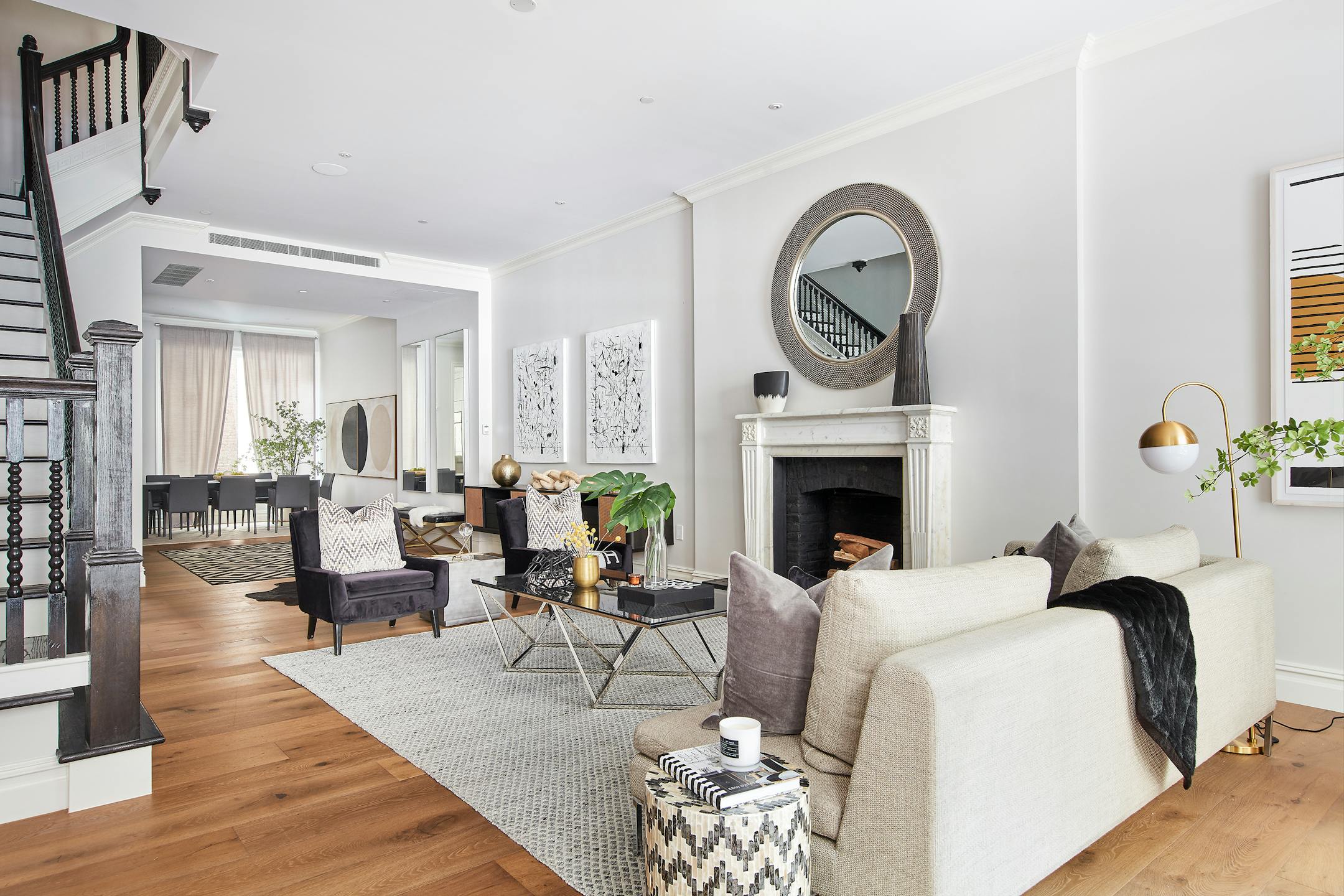 A blend of black, cream and gray is repeated throughout this living space creating a neutral, yet harmonious feel. (Scott Gabriel Morris/Handout/TNS)