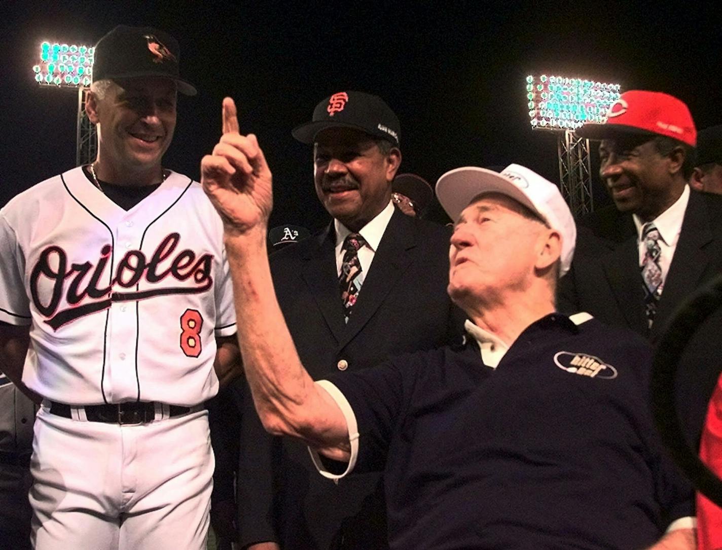 Baseball legend Ted Williams talks with All-Star Cal Ripken, of the Baltimore Orioles, left, as All-Century players Juan Marichal, second left, and Frank Robinson, right, listen Tuesday, July 13, 1999 at Boston's Fenway Park priot to the start of the All-Star Game. (AP Photo/Matt York, POOL) ORG XMIT: BXF128