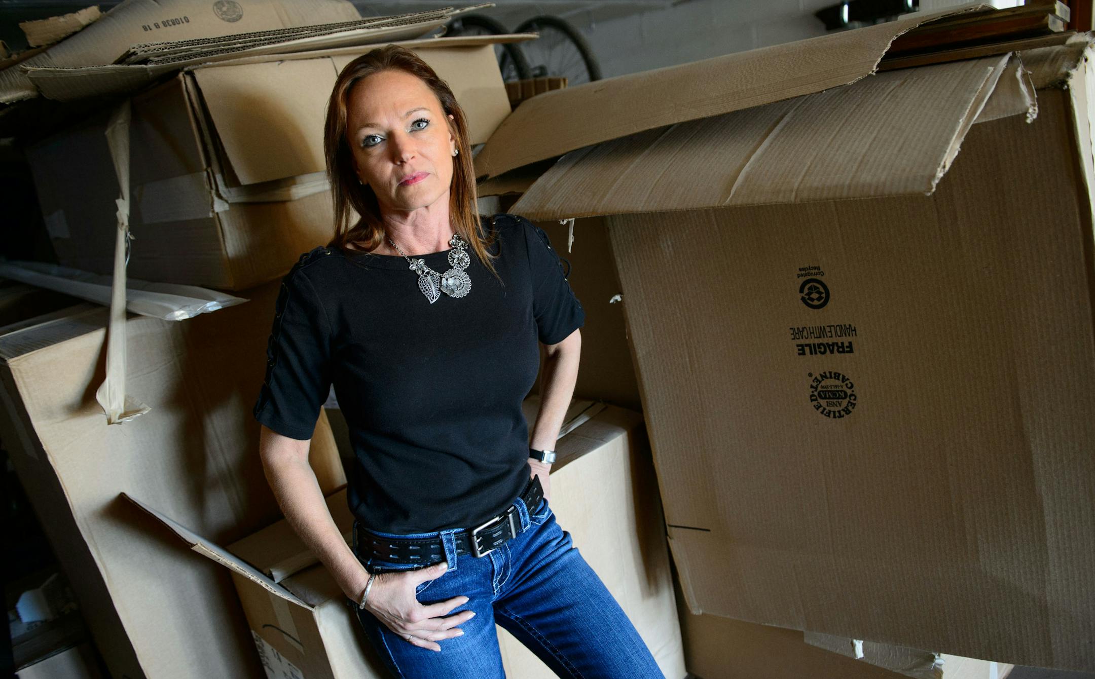 Laura Guthery with only a portion of the incorrect cabinets taking up space in her Bloomington garage. Mark Kotek allegedly scammed Laura Guthrie out of $5,000 for a kitchen remodeling project that he did not complete. She reported the fraud to Bloomington Police, and when Detective Cory Cardenas saw the case, he thought it would be nearly impossible to press criminal charges. But then an investigator with the Department of Labor and Industry told Cardenas about a little known, and little used,