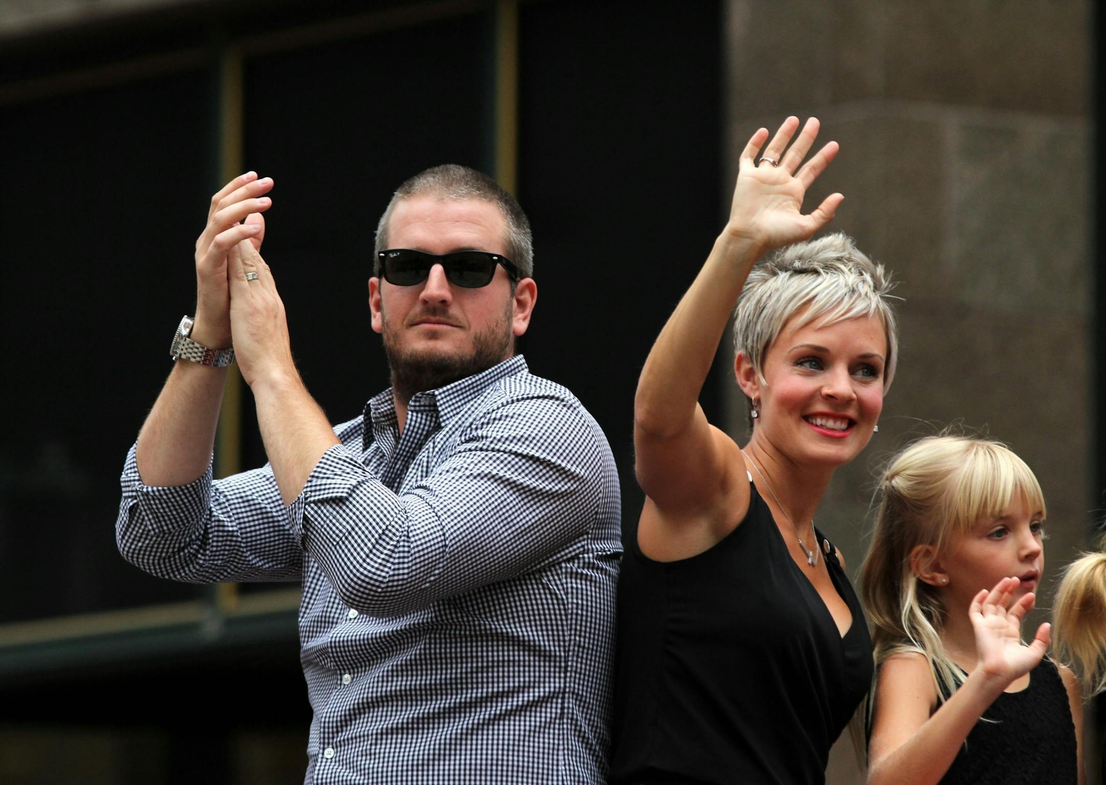 Glen Perkins of the Minnesota Twins, and his wife Alyssa Perkins, ride in the All Star Red Carpet Parade last summer in Minneapolis.