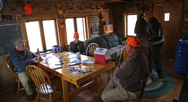 John Rabe, left, Bud Rabe, Loren Rabe and Greg Kroschel are part of a multiple-generation deer camp in Kannebec County whose family roots date to the 