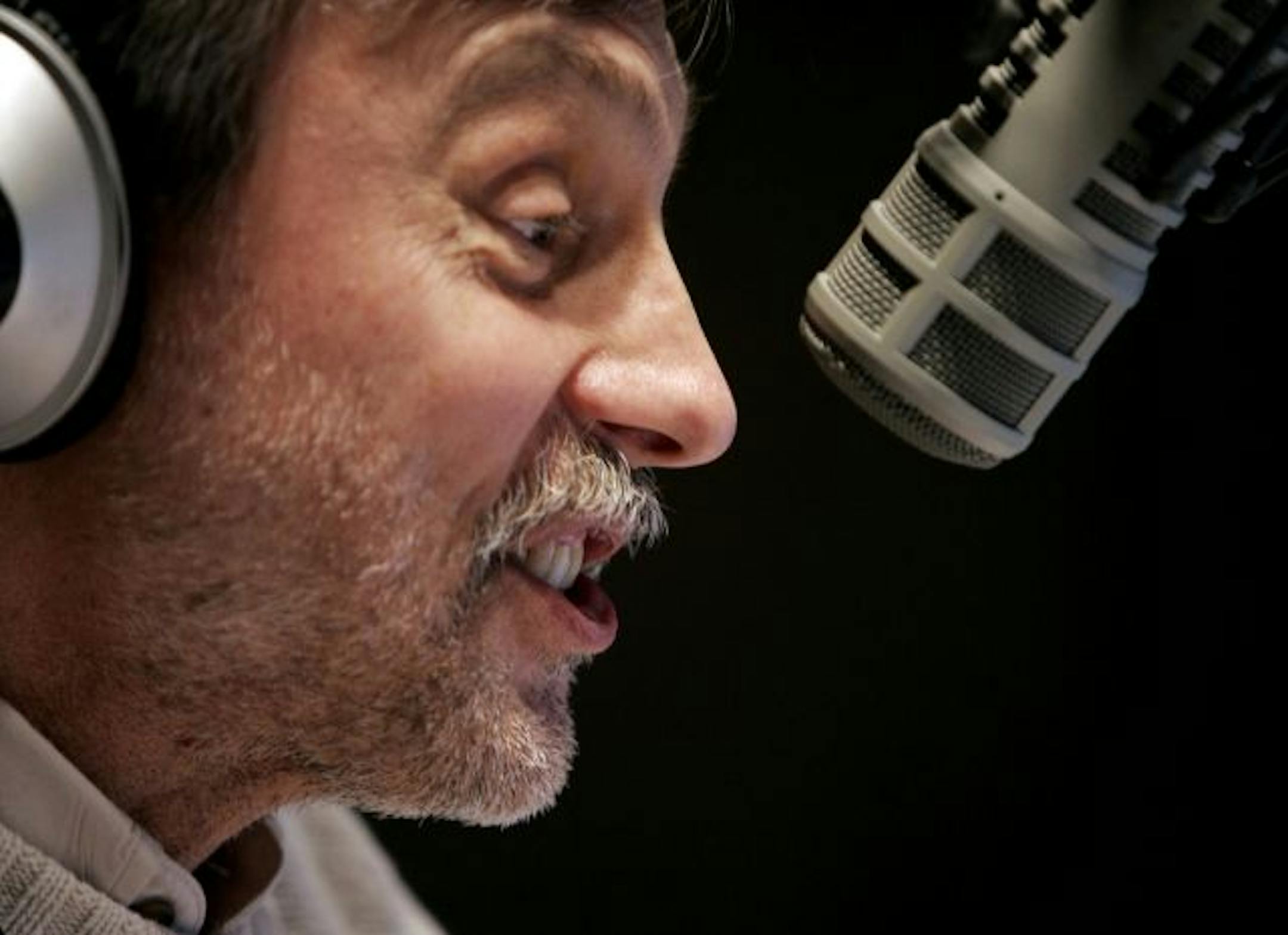 Radio talk show host Thom Hartmann speaks during his show in Portland, Ore., Monday, Feb. 12, 2007. Hartmann's progressive show, already syndicated nationally on about 30 stations, will now be offered to around 80 stations as he takes over Al Franken's plum noon-3 p.m. EST slot on Air America.