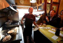 Doug Grina, a staple character at Al's Breakfast for 42 years, works behind the counter on Wednesday, Dec. 18, 2019.