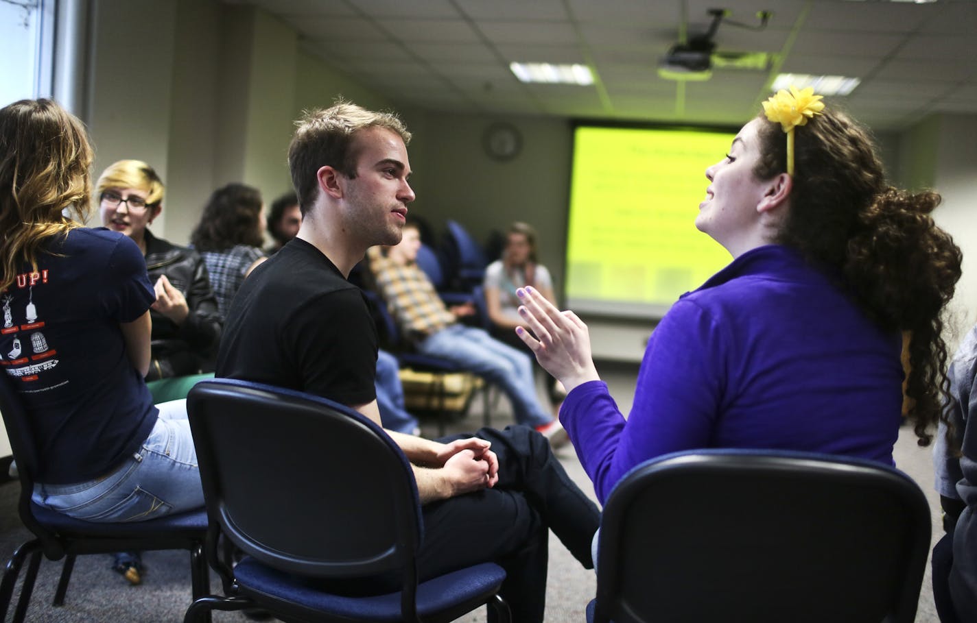 The Sexual Health Awareness and Disease Education (SHADE) student group at the University of Minnesota had their final weekly meeting of the semester at Boynton's East Bank Clinic Thursday, May 1, 2014, in Minneapolis, MN. Members of the group help to educate students on campus about making healthy sex activity decisions. Here, SHADE members, including Meg Hughes-Morrison, right to left, and Brennan Berry, participated in talking out gender specifiers in a story during a session on GLBT identiti