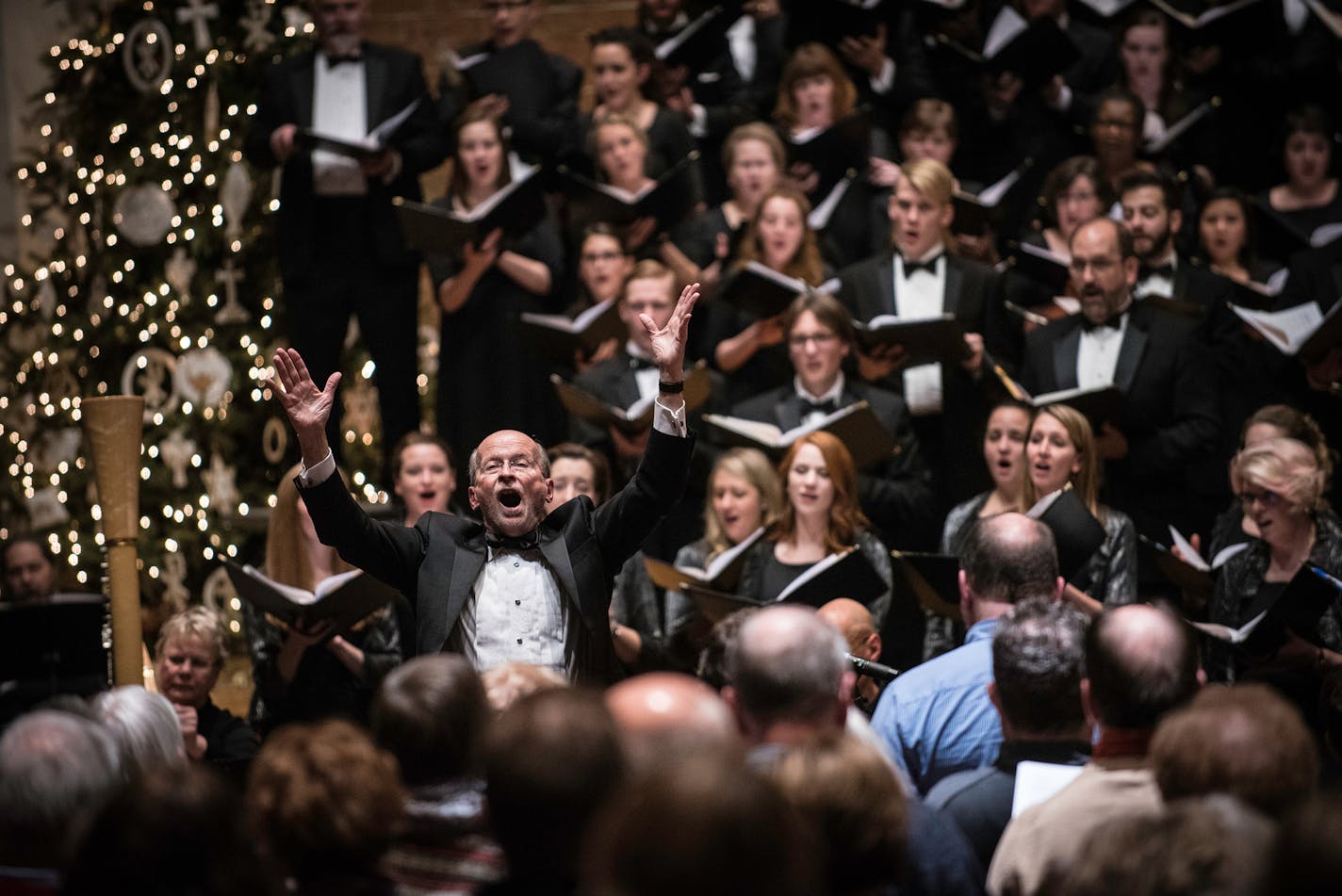 VocalEssence founder Philip Brunelle, center, presides over his 50th season.