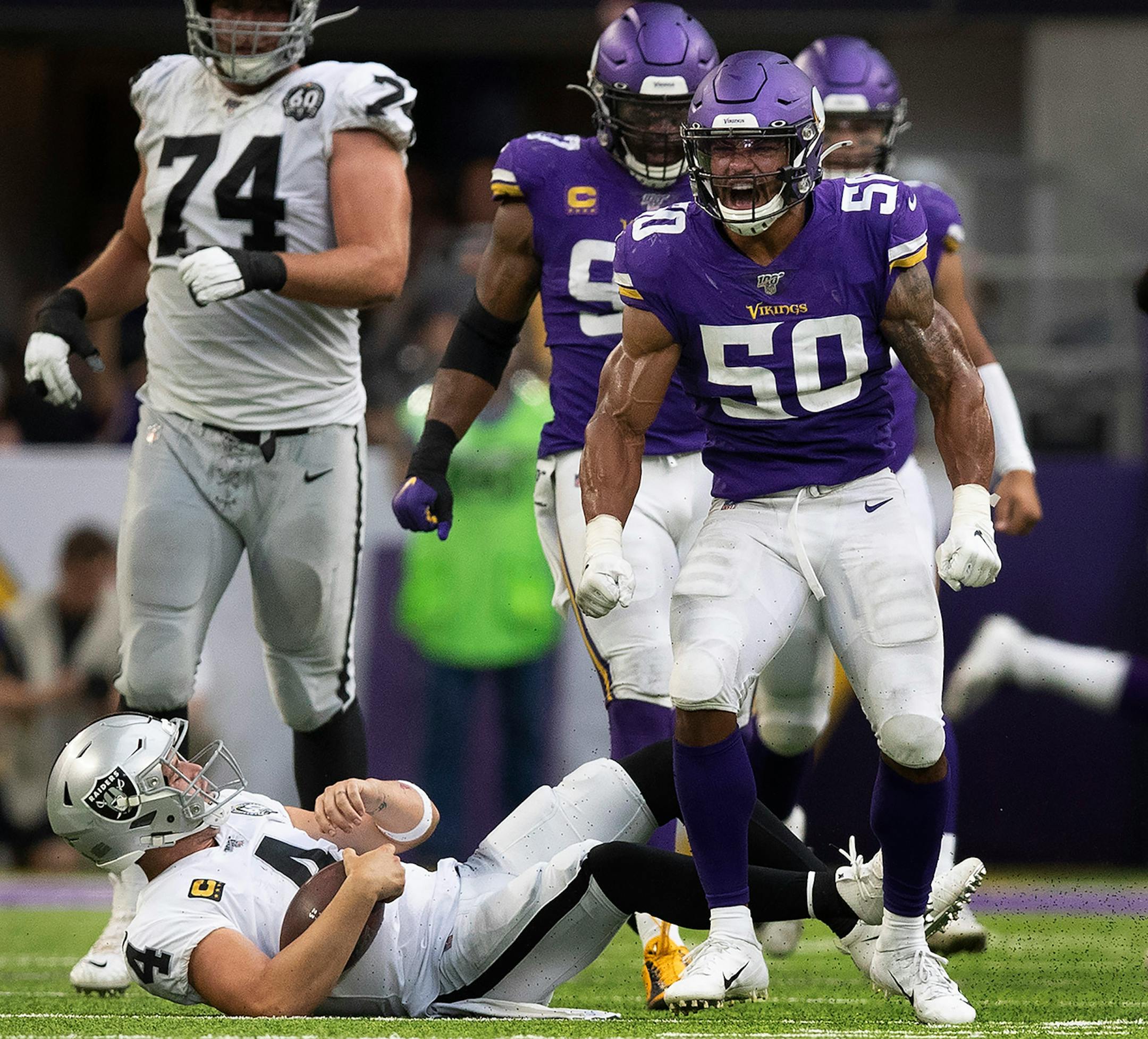 Minnesota Vikings linebacker Eric Wilson (50) celebrated his fourth quarter sack on Oakland Raiders quarterback Derek Carr (4).
