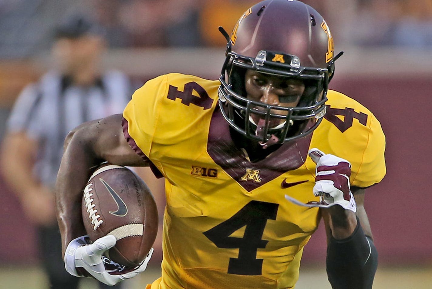 Minnesota wide receiver Donovahn Jones ran for the second touchdown in the end zone during the second quarter in the opening game against Eastern Illinois at TCF Bank Stadium, Thursday, August 28, 2014 in Minneapolis, MN. ] (ELIZABETH FLORES/STAR TRIBUNE) ELIZABETH FLORES &#x2022; eflores@startribune.com ORG XMIT: MIN1408282004519728