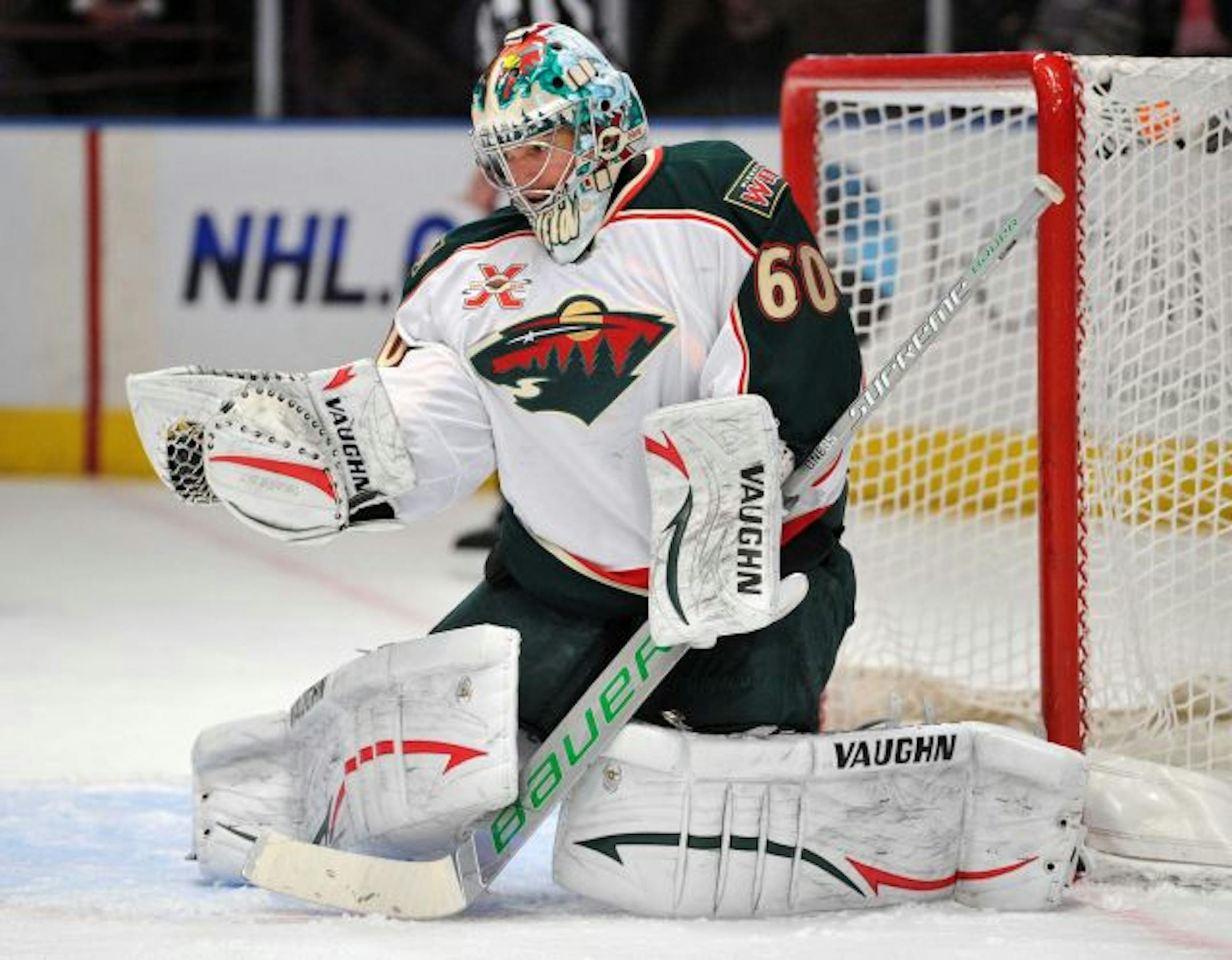 Minnesota Wild goalie Jose Theodore (60) makes a save during the first period against the New York Rangers at Madison Square Garden in New York on Thursday, March 3, 2011.